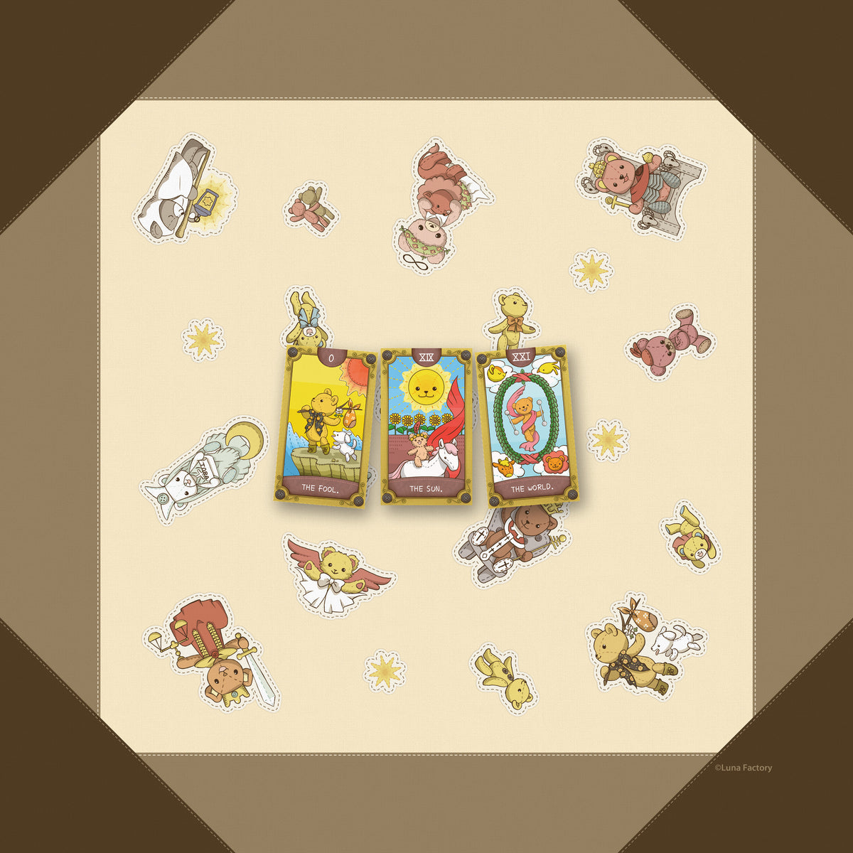 Luna's Bear reading cloth in use with three tarot cards at true scale